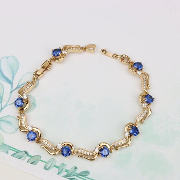 "Elegant Rose Gold Bracelet with Sapphire Blue and Crystal Accents, XPBL0804 - Picture 4 of 12
